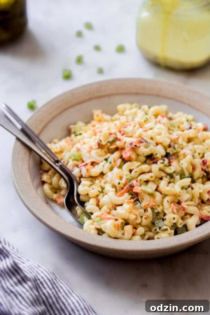 Crave-Worthy Macaroni Salad 3 side shot of dressed and prepared pasta salad showcasing elbow macaroni
