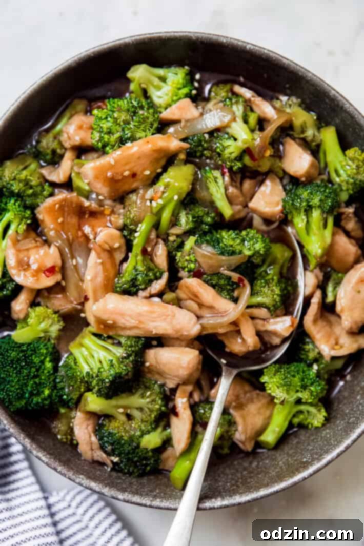 green speckled bowl filled with prepared stir fry