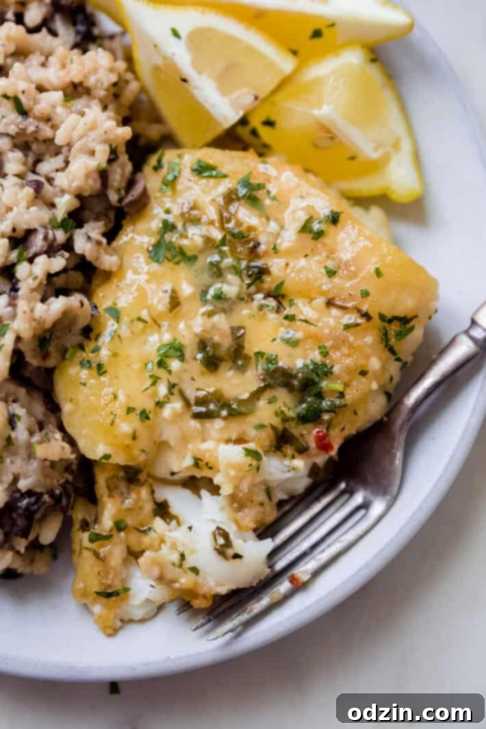 The Ultimate Pan-Fried Fish with Fresh Basil and Zesty Lemon Butter 8 basil lemon butter fried fish filet on plate flaked