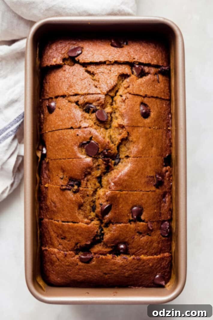 sliced pumpkin loaf in baking tin