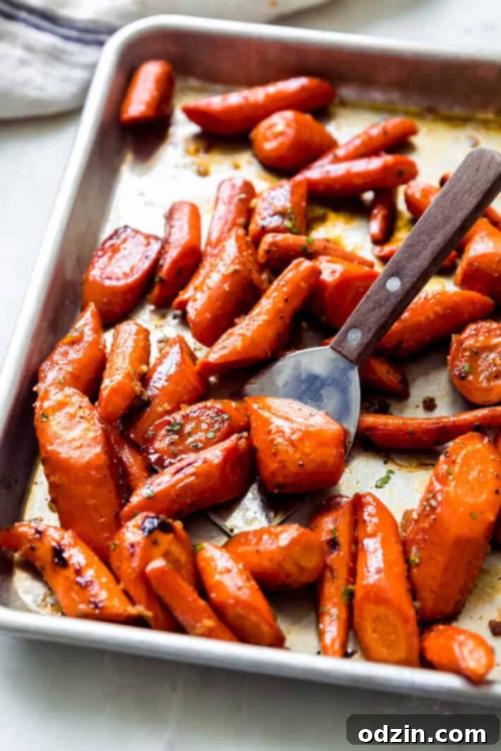 garlic butter roasted carrots on sheet pan