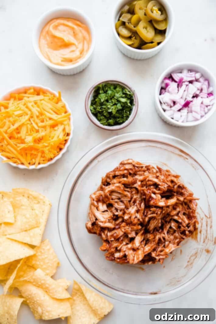 ingredients in bowls of bbq chicken nachos