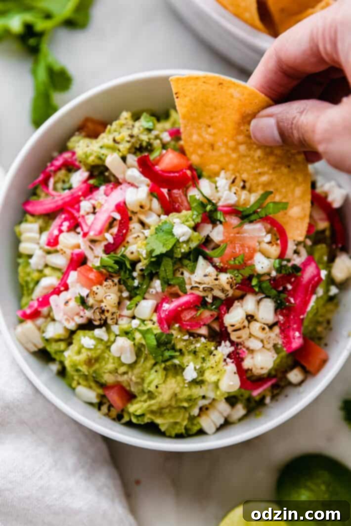 A glass jar with freshly sliced red onions, ready for the pickling liquid
