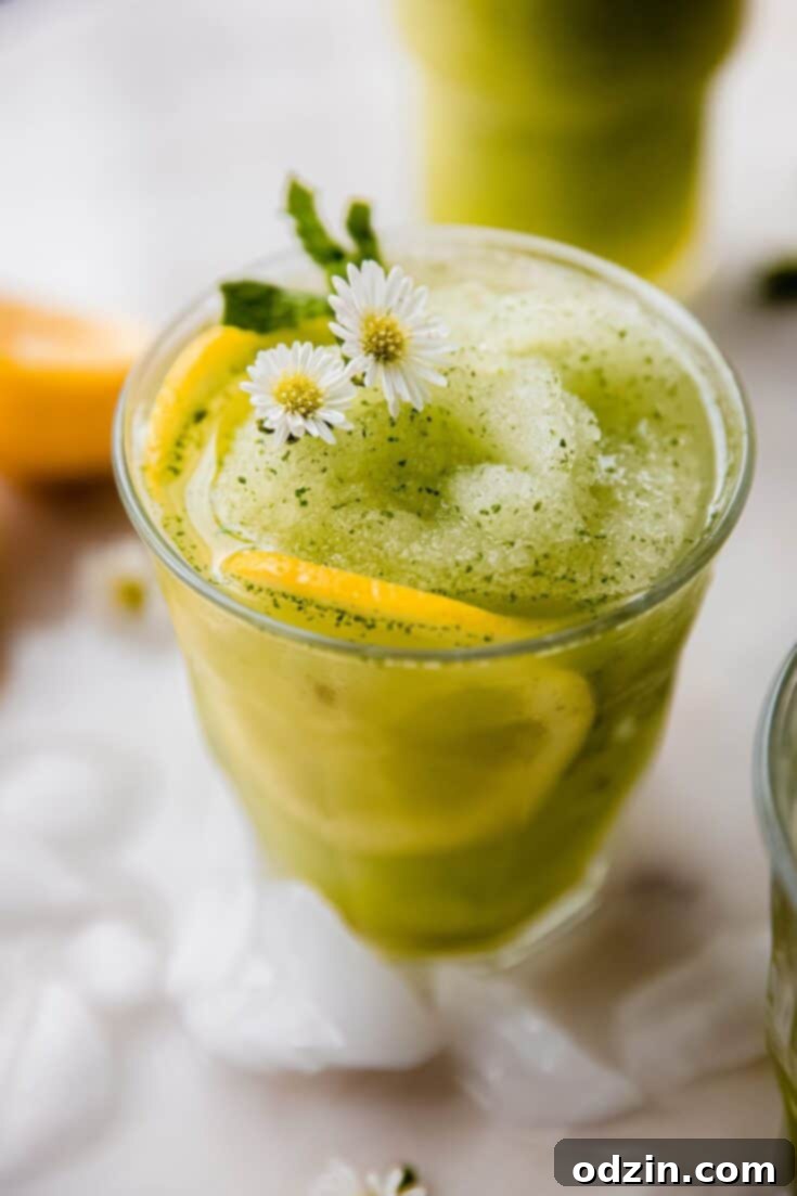 Most Refreshing Frozen Mint Lemonade (Limonana) in a glass.