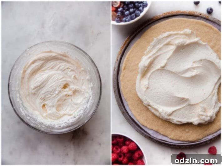 whipped cream cheese icing ready to be spread on sugar cookie crust