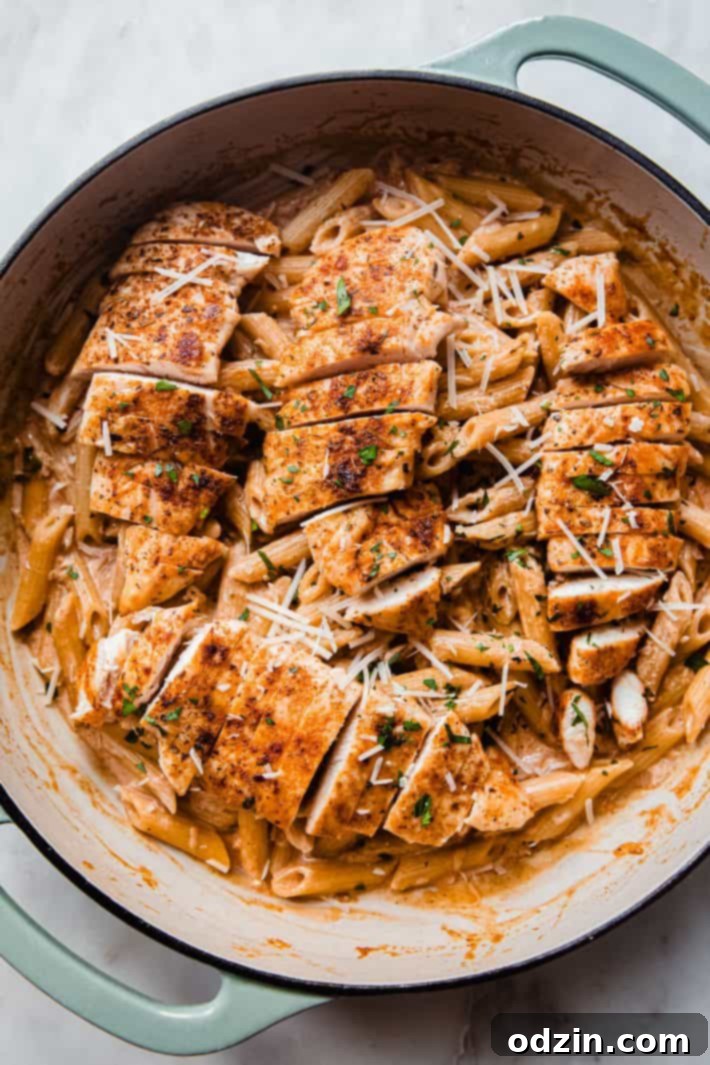 Sizzling Paprika Chicken Pasta in a Skillet, Ready to Serve