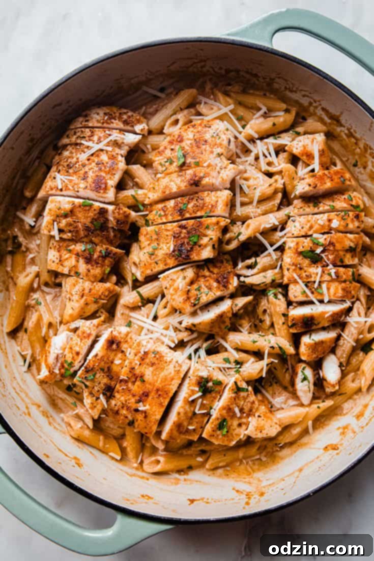 Creamy Paprika Chicken Pasta with fresh parsley garnish