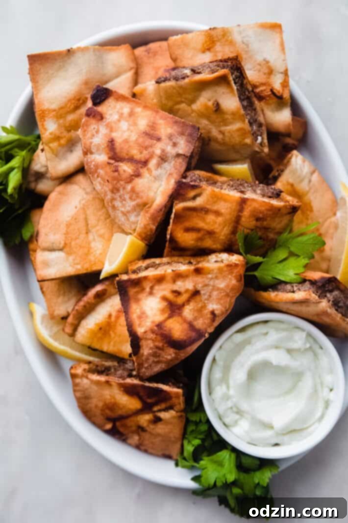 Toum: The Creamy Lebanese Garlic Sauce 7 arayes with garlic sauce in small bowl