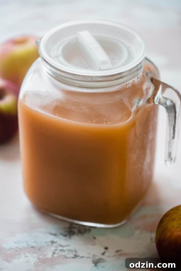 Crafting Your Own Apple Cider 7 carafe full of apple cider
