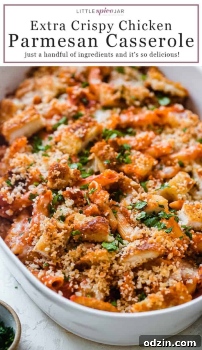 Crispy Chicken Parmesan Casserole with a crispy topping and melted cheese, perfect for a family dinner.
