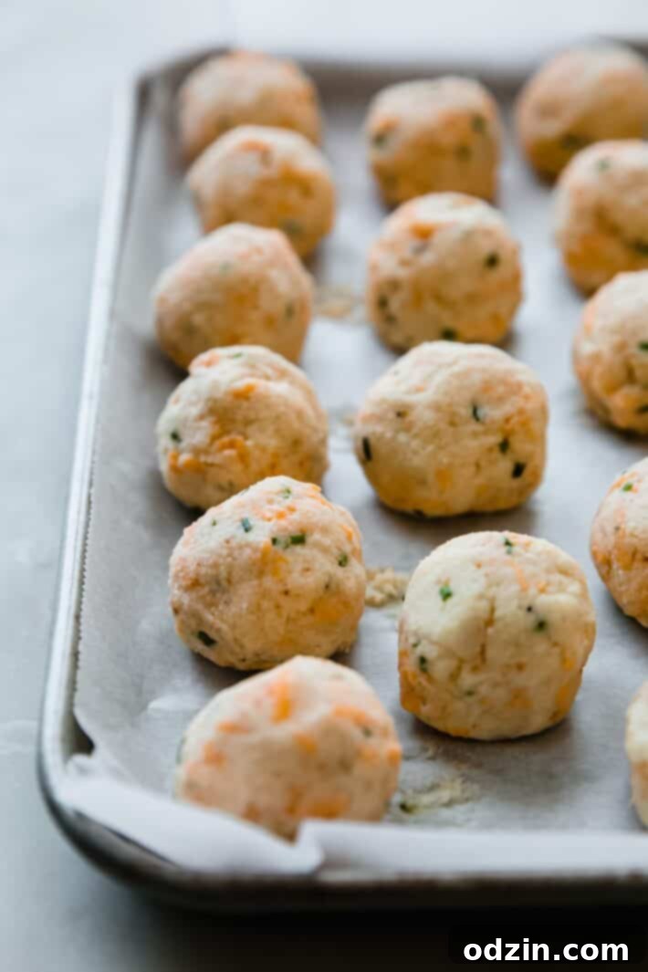 balls on baking sheet with parchment