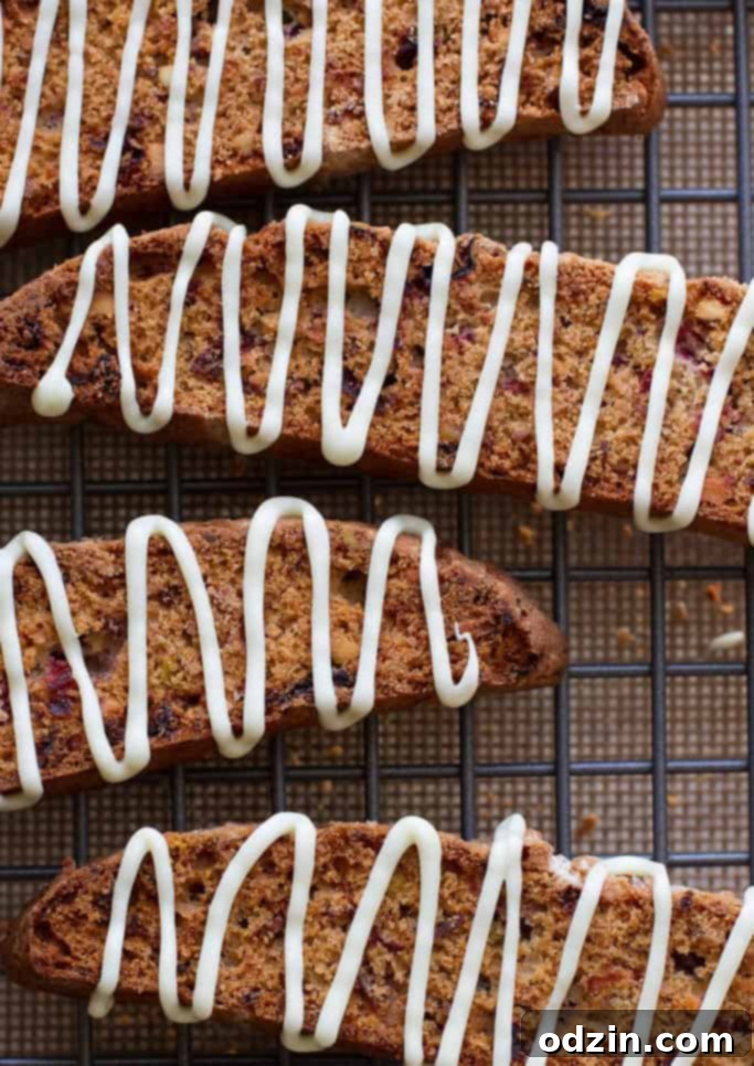 Cranberry Pistachio Biscotti with White Chocolate Drizzle on Pinterest