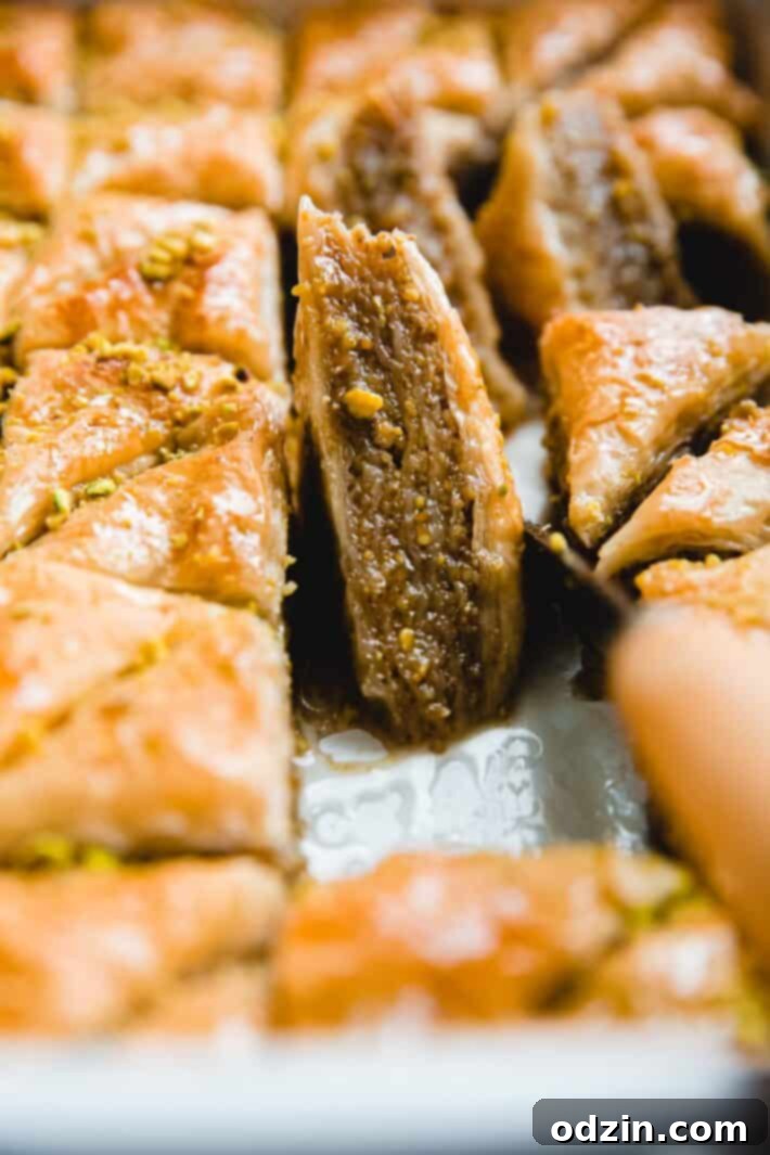baklava square in baking dish with knife
