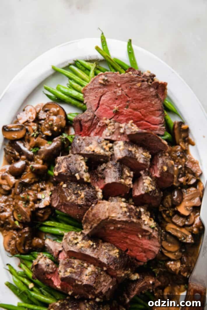 sliced roast with mushroom pan sauce and sautéed green beans