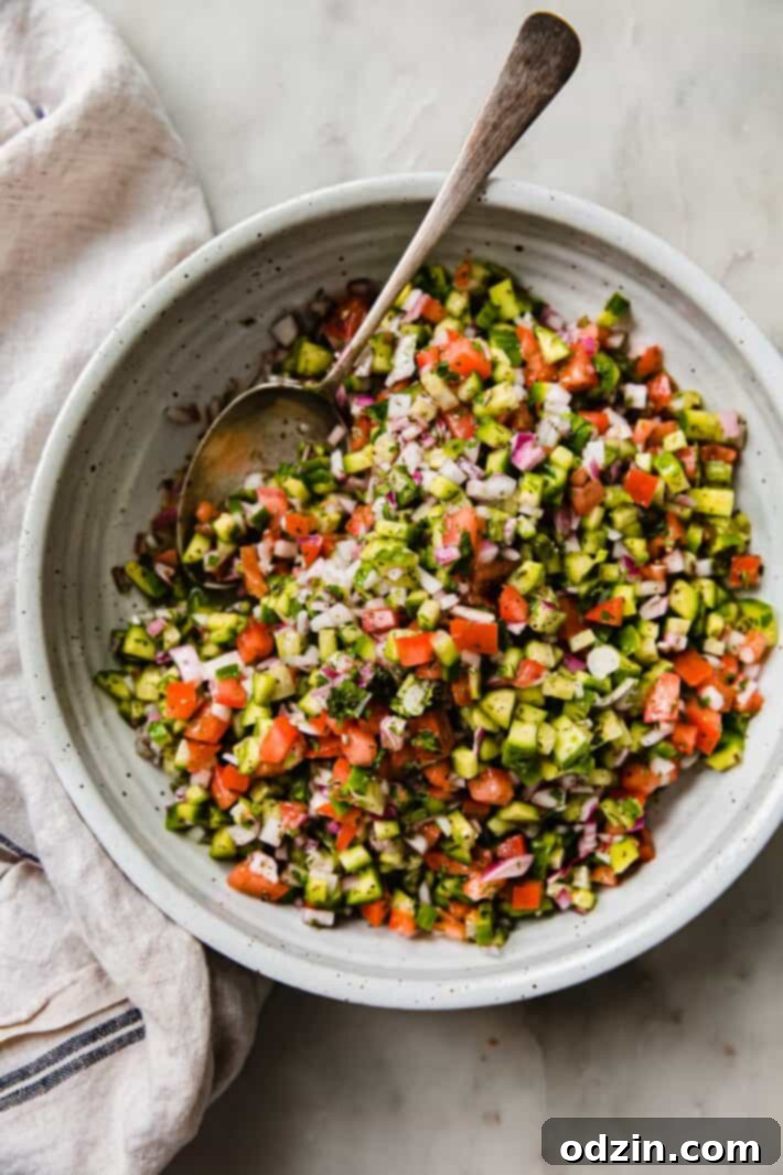 Shirazi salad in speckled bowl