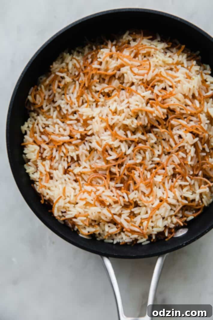 prepared rice pilaf in saucepan