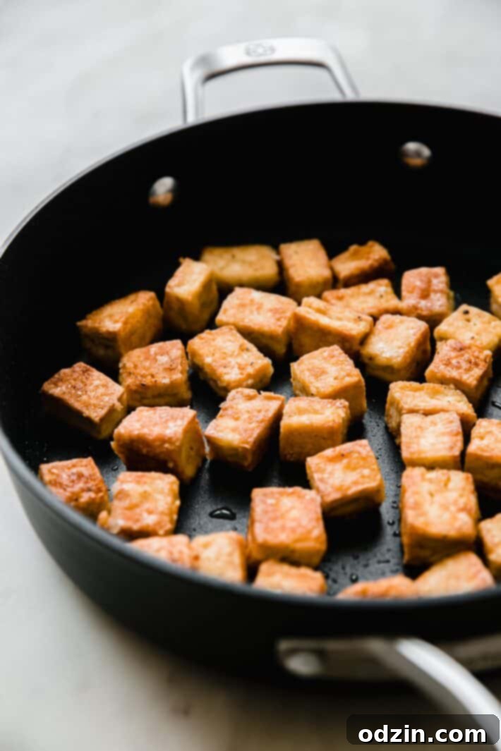 crispy tofu in nonstick pan
