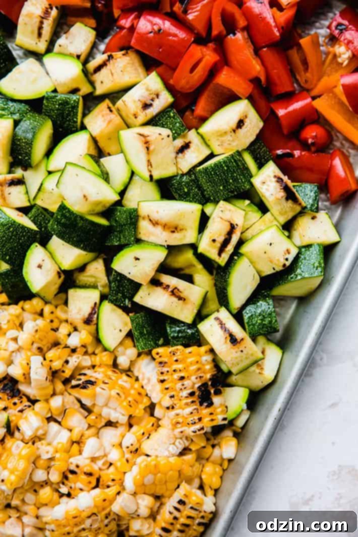 Smoky Grilled Zucchini and Sweet Corn Salad with Bell Peppers 5 Sliced grilled veggies on sheet pan