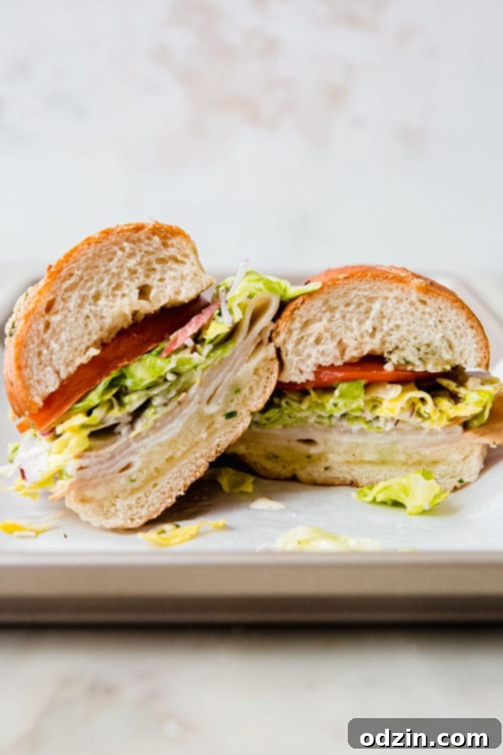 grinder salad sandwich halves on sheet pan