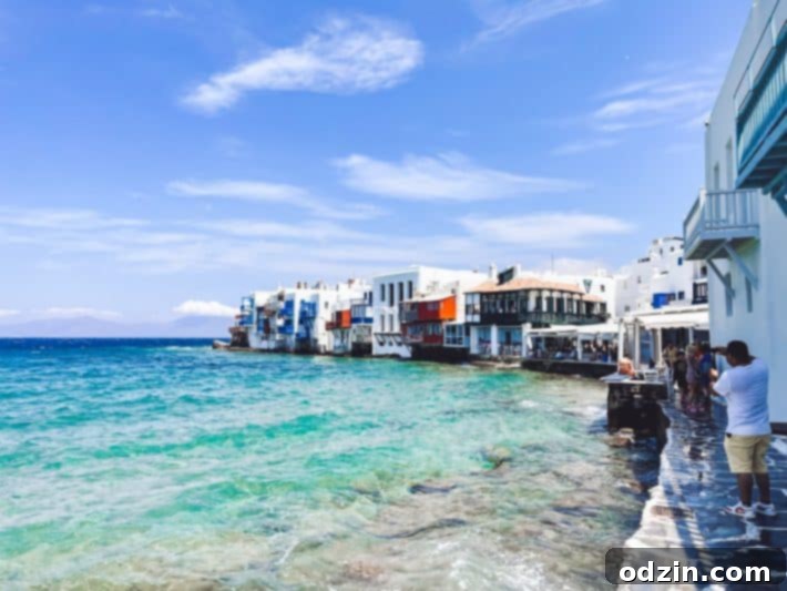 Picturesque view of Little Venice in Mykonos with traditional buildings over water
