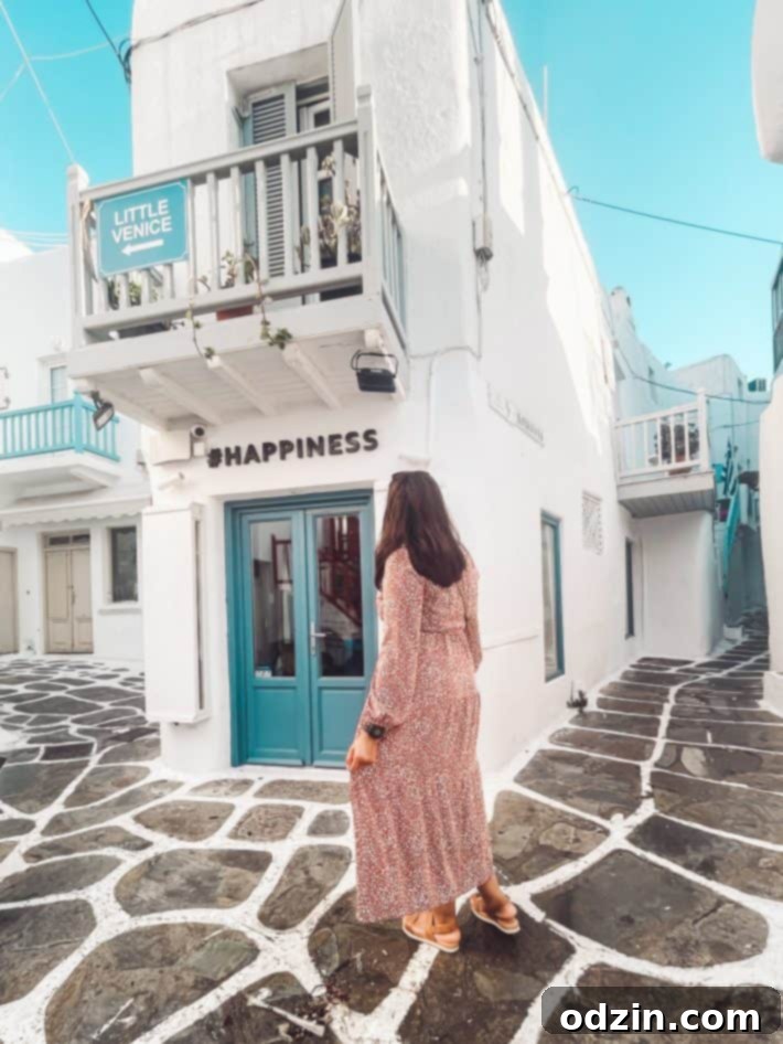 The vibrant facade of the #happiness store in Mykonos Town