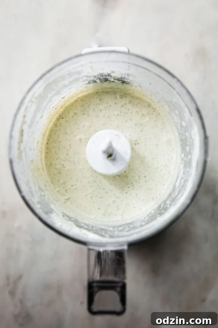 Vibrant Honey Harissa Chicken Bowls with Cooling Feta Mint 5 Feta mint sauce in food processor bowl