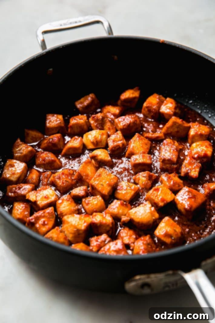 Vibrant Honey Harissa Chicken Bowls with Cooling Feta Mint 6 Honey harissa chicken in saute pan