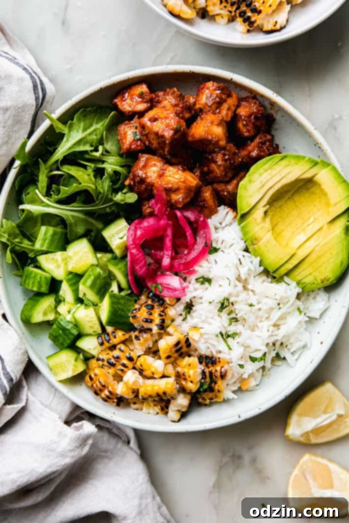 Vibrant Honey Harissa Chicken Bowls with Cooling Feta Mint 7 Honey harissa chicken bowl on white marble