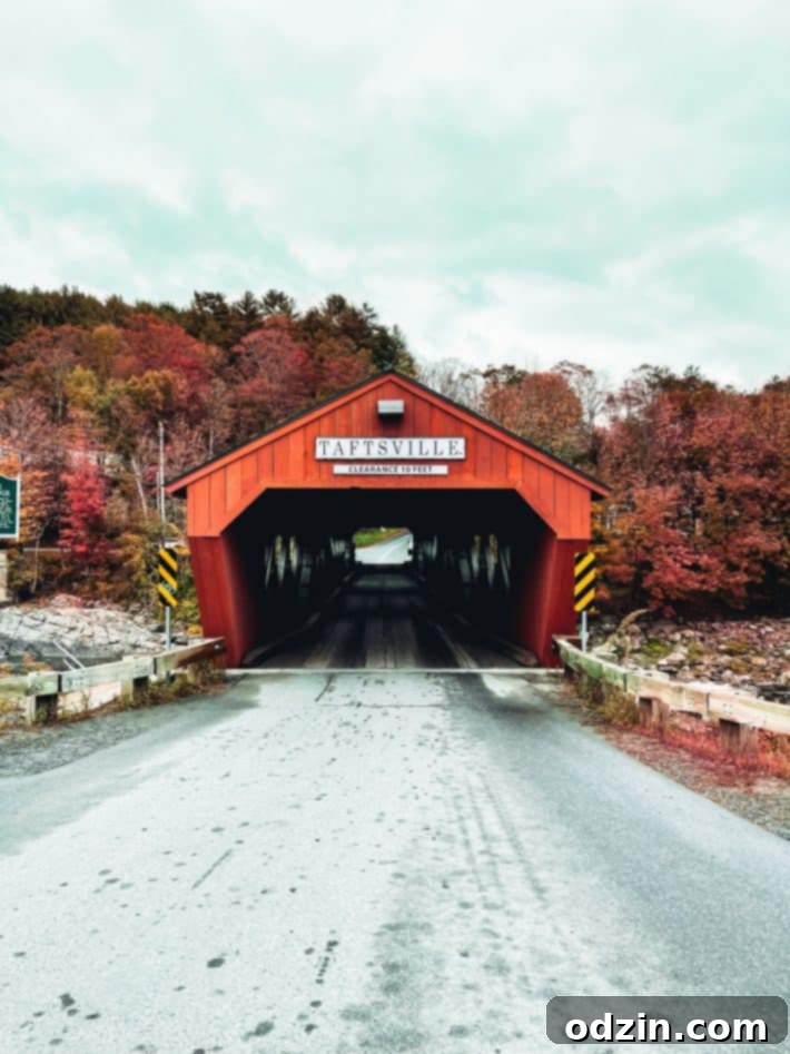 Taftsville red covered bridge in Vermont, autumn scene
