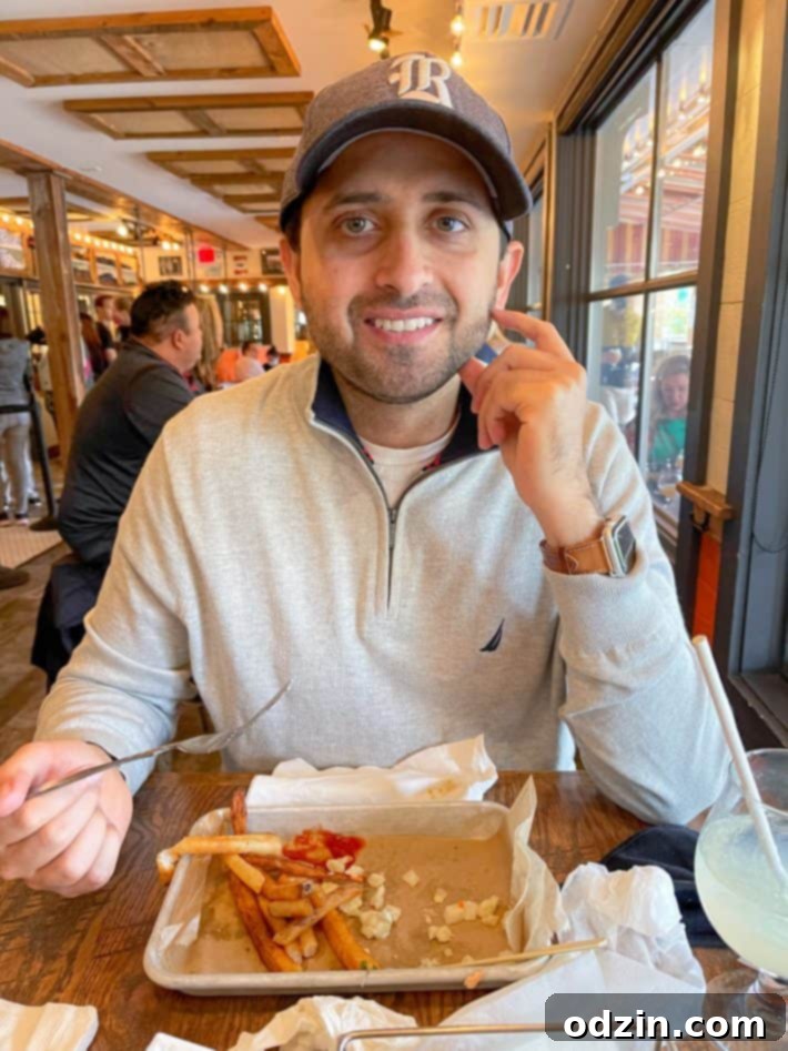 Man enjoying a meal at Worthy Kitchen