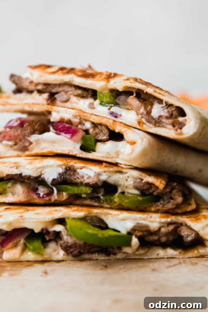 Chipotle Philly Cheesesteak Quesadillas 2 steak quesadillas in a stack