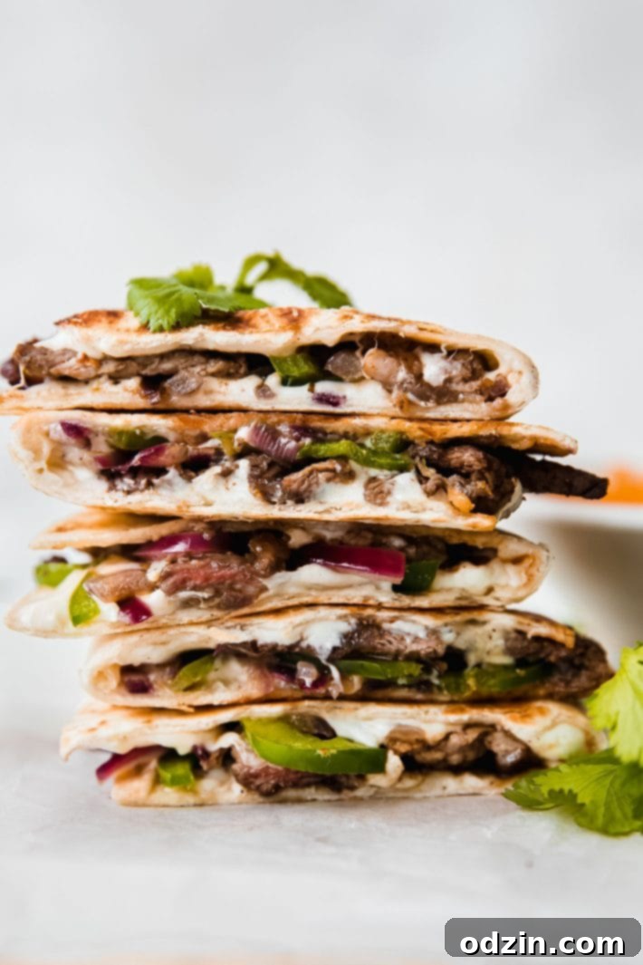Chipotle Philly Cheesesteak Quesadillas 6 cheesesteak quesadillas stacked