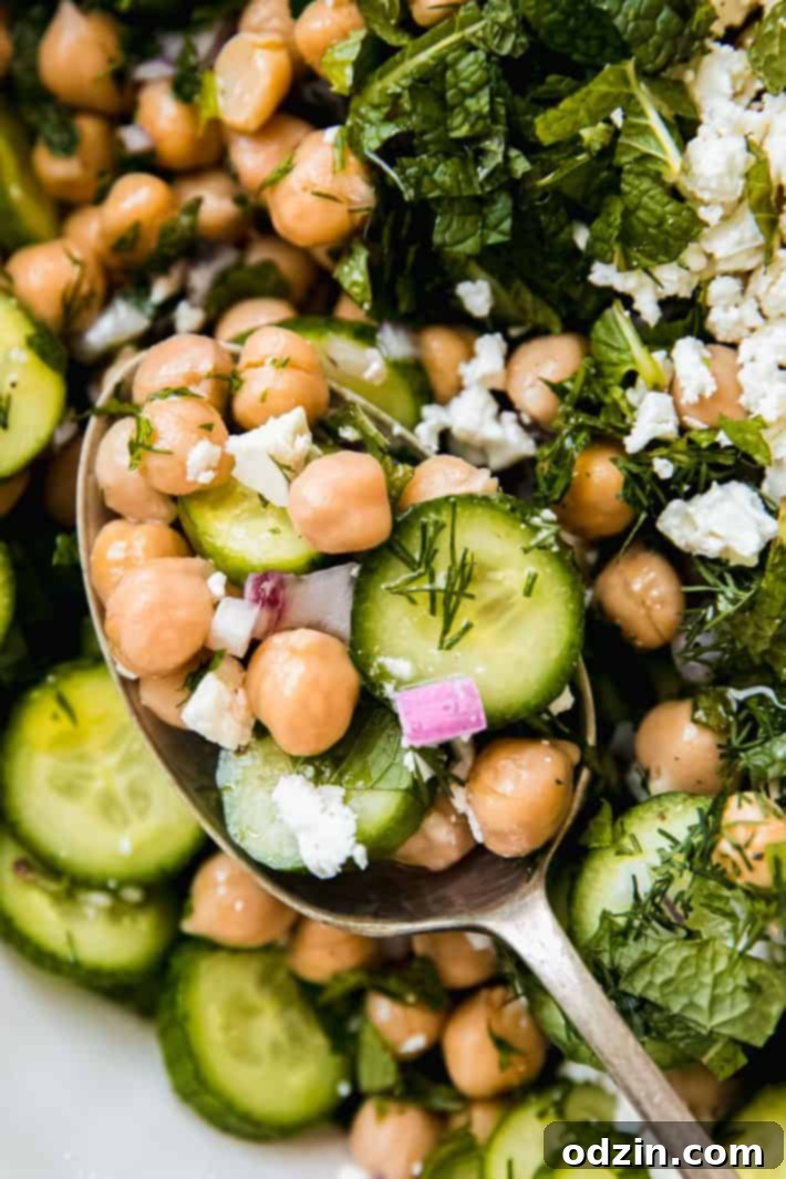 close up of dill chickpeas, feta, and cucumbers