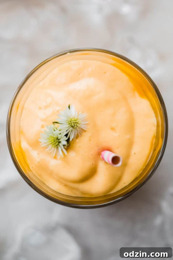 whipped mango yogurt smoothie in cup