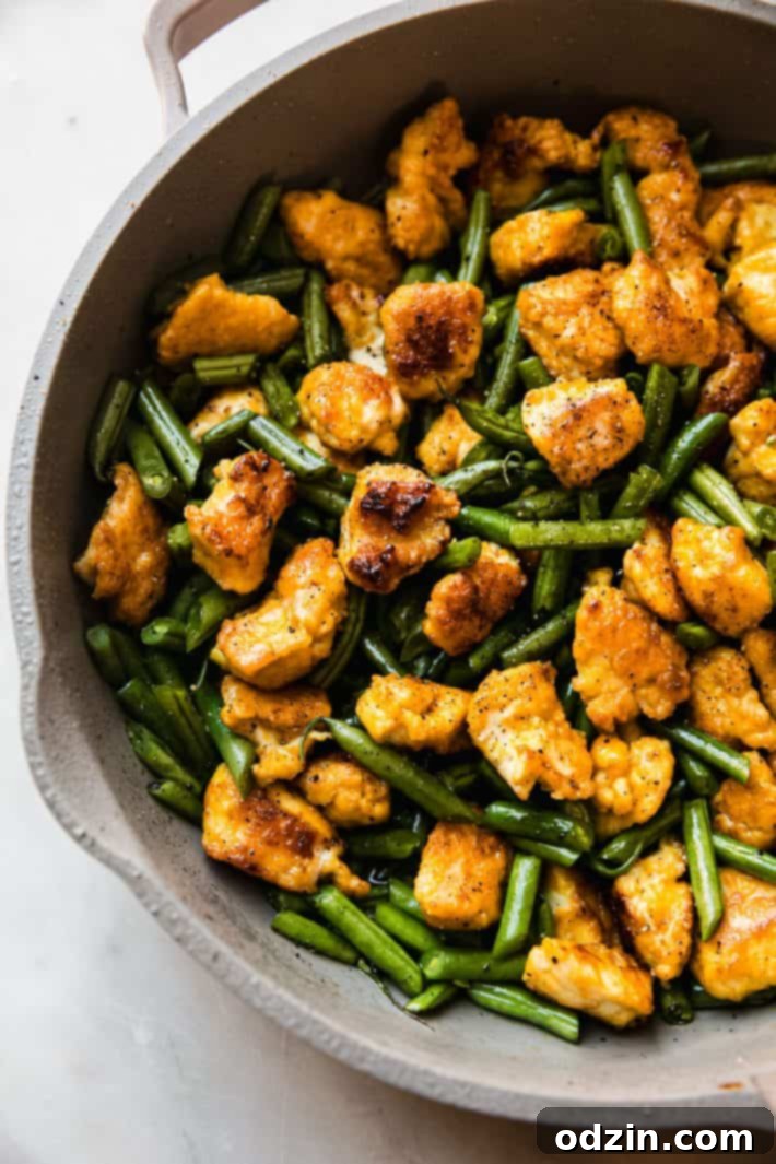 chicken green bean stir fry in skillet