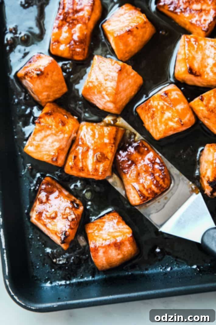 prepared broiled honey salmon on baking sheet