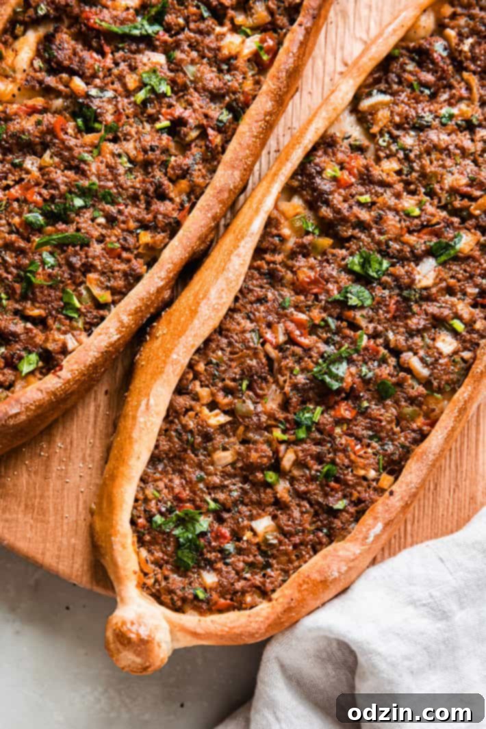 Pide: Turkey's Iconic Flatbread 6 prepared Turkish flatbread on cutting board