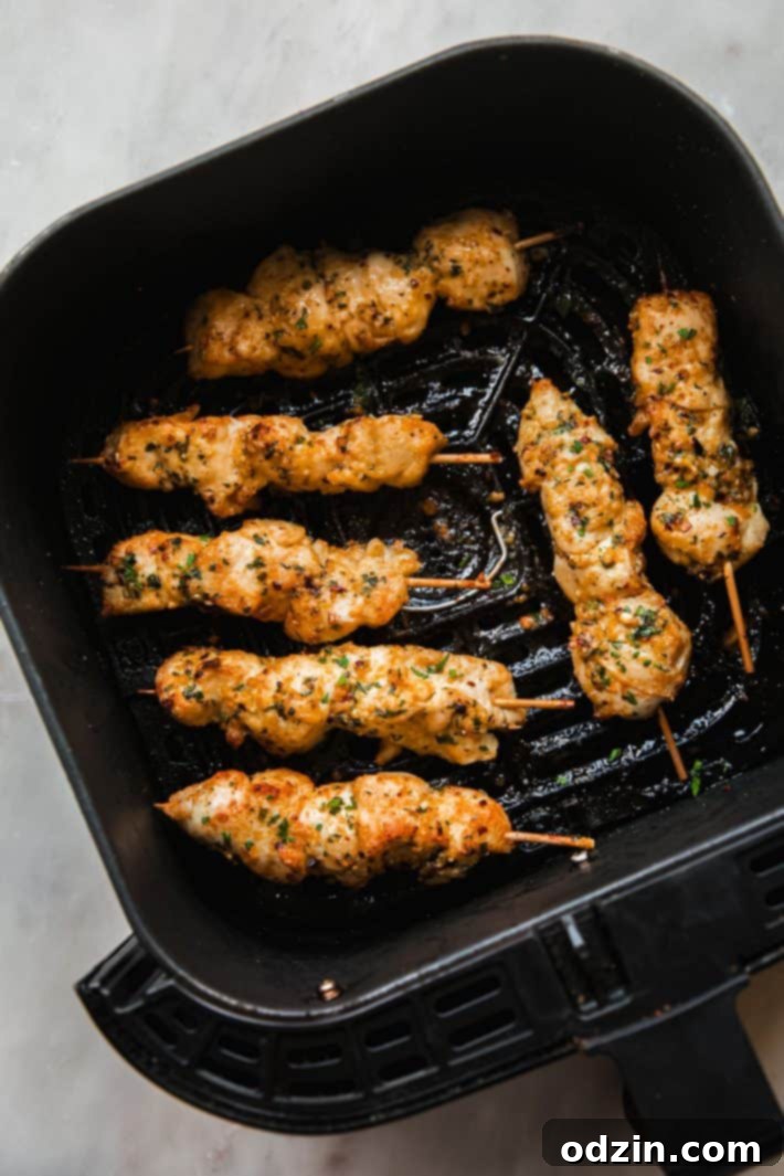 Golden Garlic Parmesan Chicken Skewers 5 chicken skewers in the air fryer