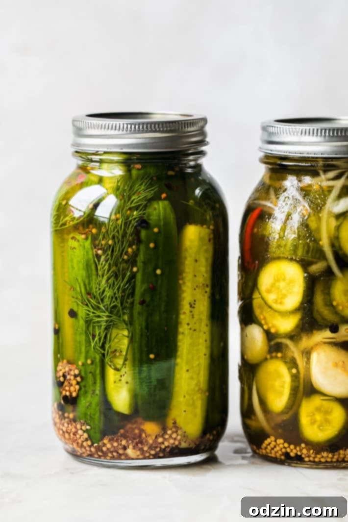 refrigerator pickles in two jars. One with spears and the other with pickle chips