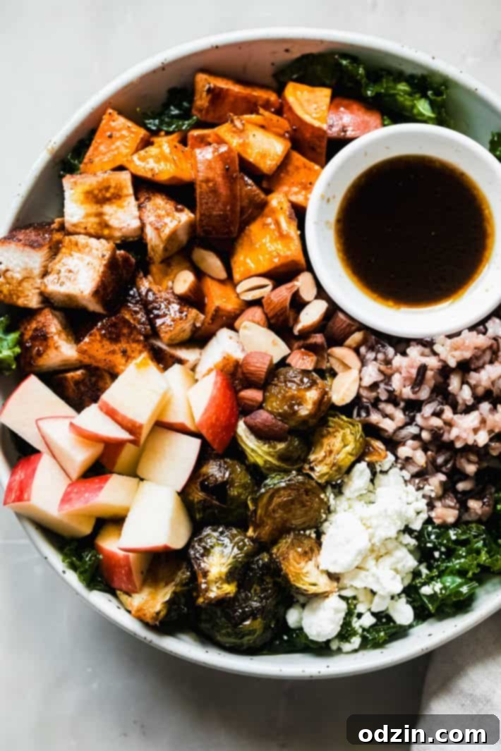 Vibrant Autumn Harvest Bowls featuring roasted vegetables, chicken, and a drizzle of balsamic vinaigrette