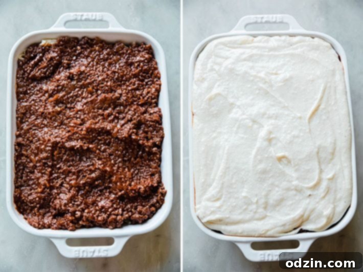 Egyptian Béchamel Macaroni Bake 6 An unbaked casserole dish of Macarona Bechamel, clearly showing the distinct layers of penne pasta, spiced meat sauce, and creamy béchamel, ready for the oven.