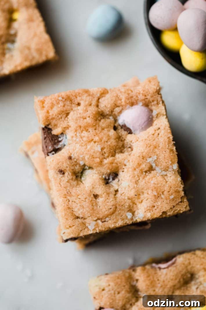 Decadent Brown Butter Cadbury Mini Egg Blondies 6 blondie pieces speckled with malden salt and chopped mini eggs