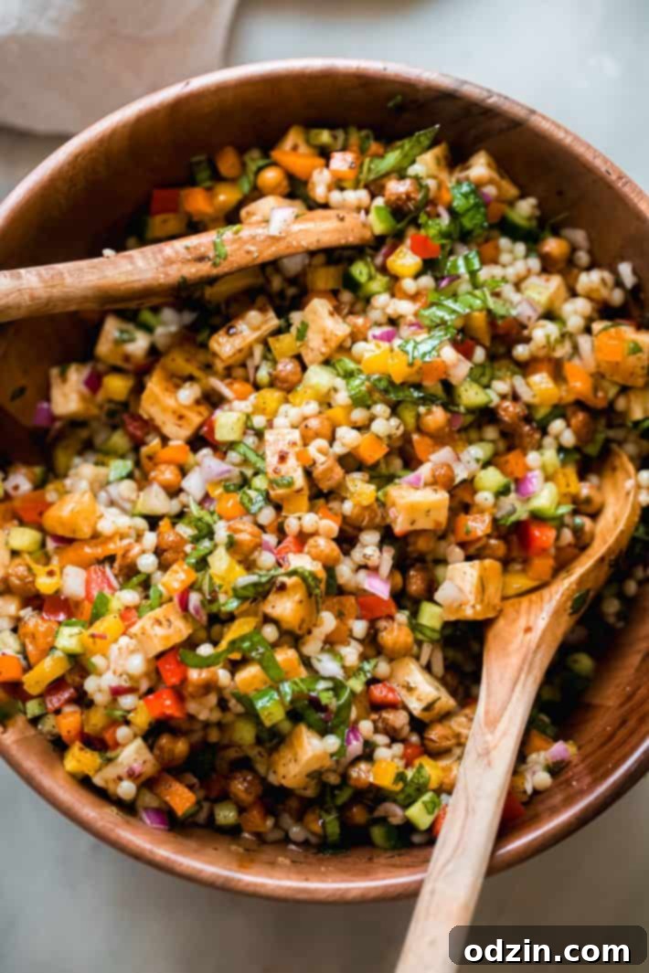 Lemon Mint Halloumi Salad 6 salad in bowl with wooden spoons