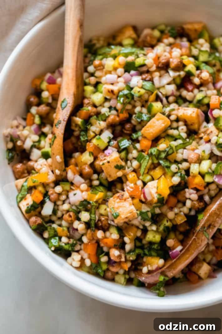 Lemon Mint Halloumi Salad 7 cucumber, pearl couscous, halloumi salad in white bowl