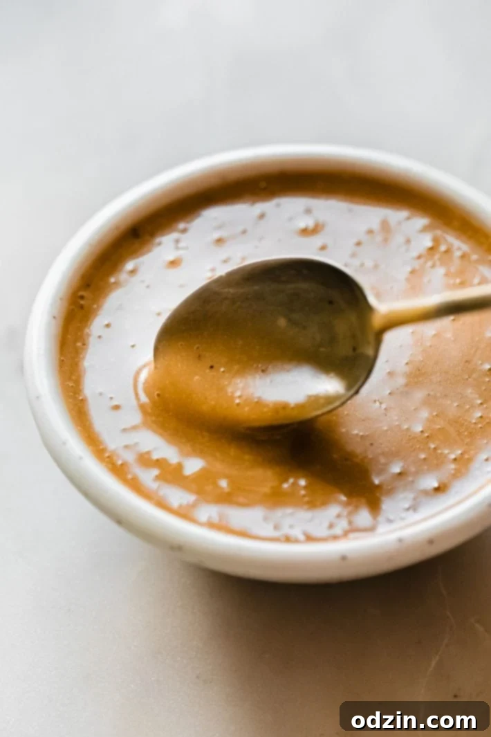 lime balsamic vinaigrette in bowl with spoon