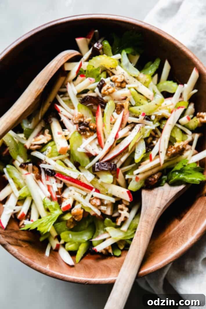 salad in bowl with spoons