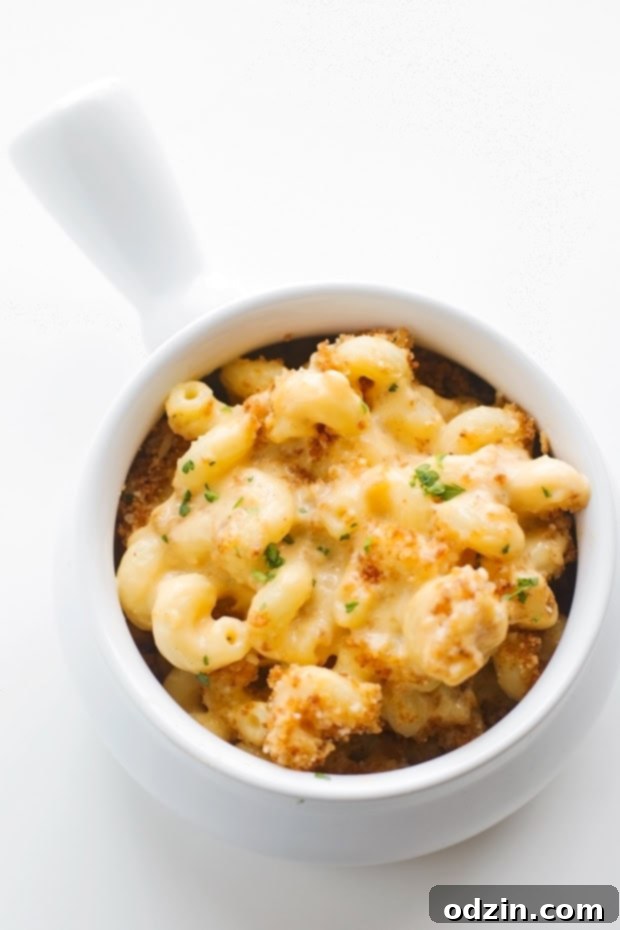 Close-up of creamy mac and cheese showing the rich sauce and noodles