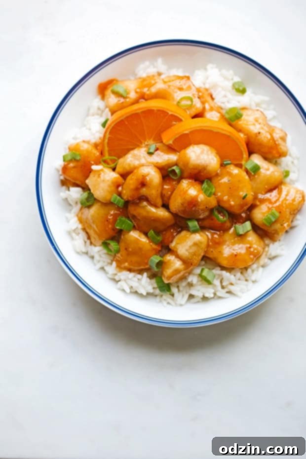 Lighter Orange Chicken - takes just 30 minutes from start to finish and totally healthier than your local take-out! #asianchicken #orangechicken #sweetandsourchicken #chinesefood | Littlespicejar.com Lighter Orange Chicken - takes just 30 minutes from start to finish and totally healthier than your local take-out! #asianchicken #orangechicken #sweetandsourchicken #chinesefood | Littlespicejar.com