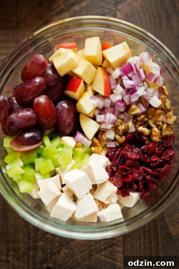 Healthier Chicken Salad Sandwich - a healthier spin on the traditional chicken salad sandwich! My recipe is flavorful so you won't even miss the calories! #chickensalad #chickensaladsandwich #lighterchickensalad #lightchickensalad | LIttlespicejar.com