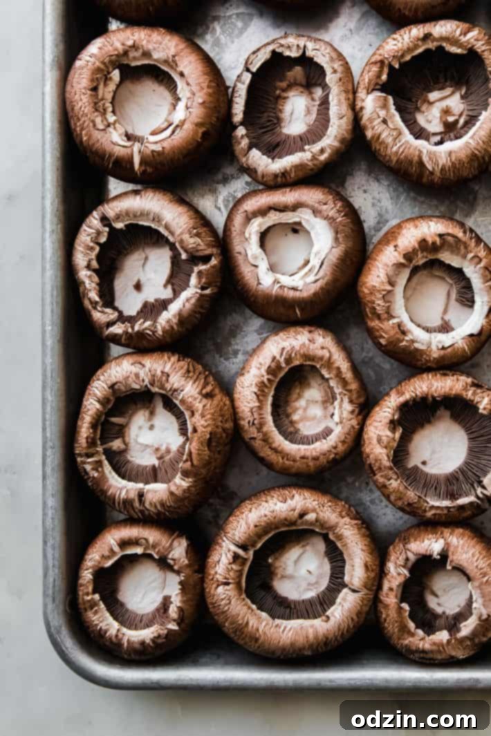 cleaned mushroom caps in sheet pan